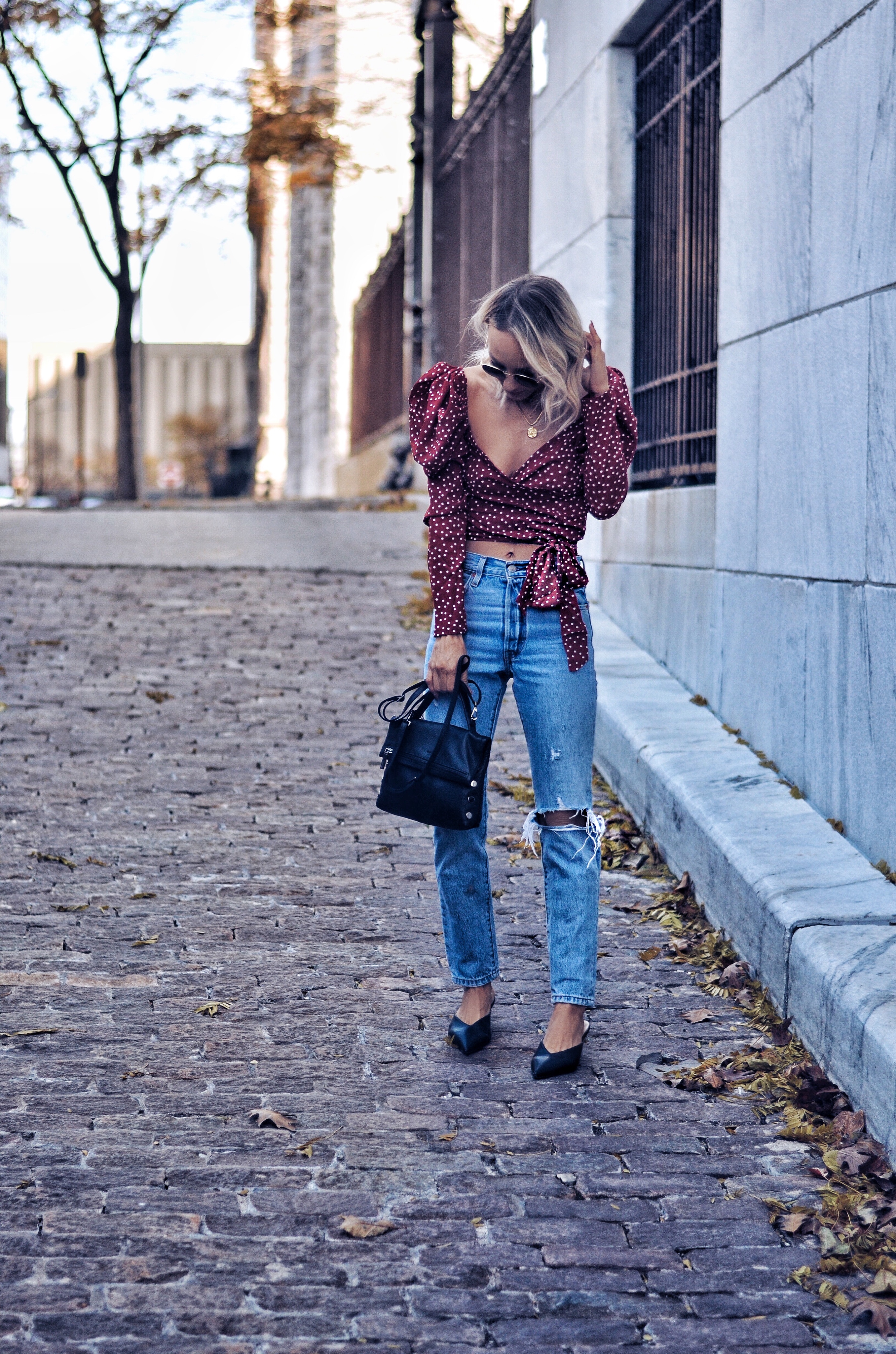 red and white polka dot wrap top