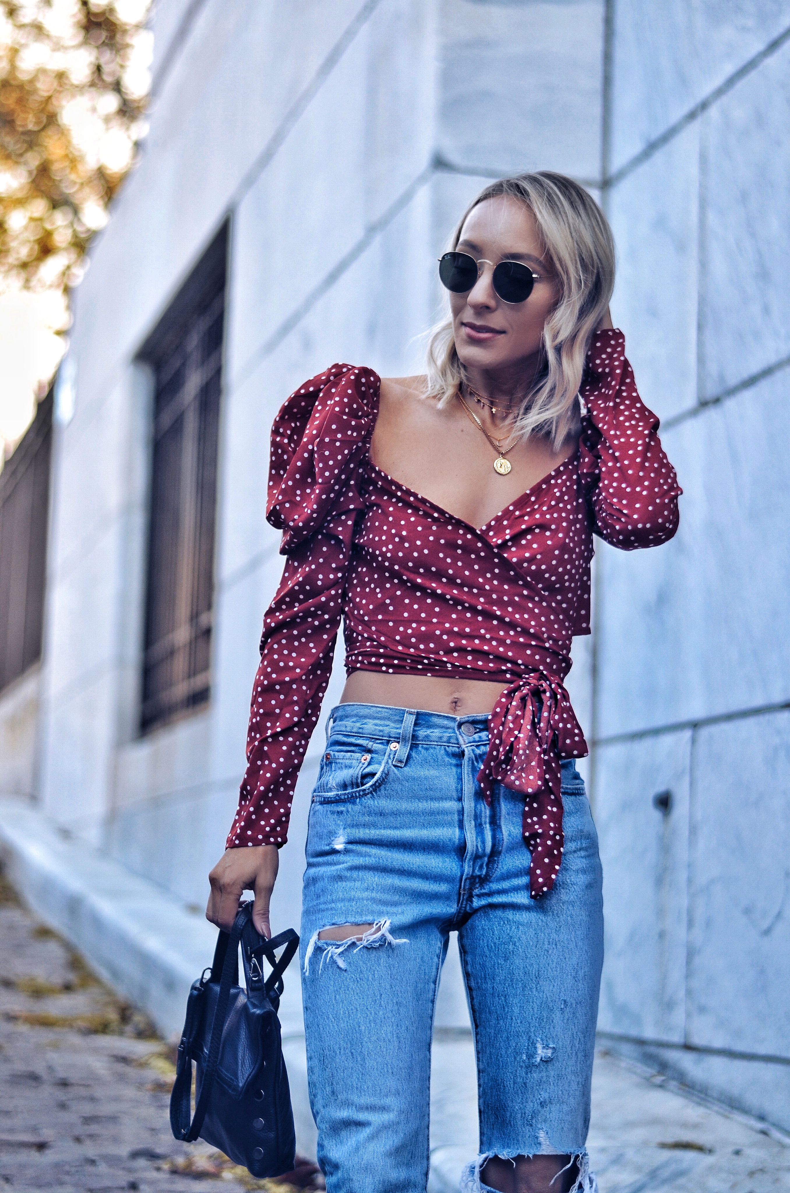 red and white polka dot wrap top