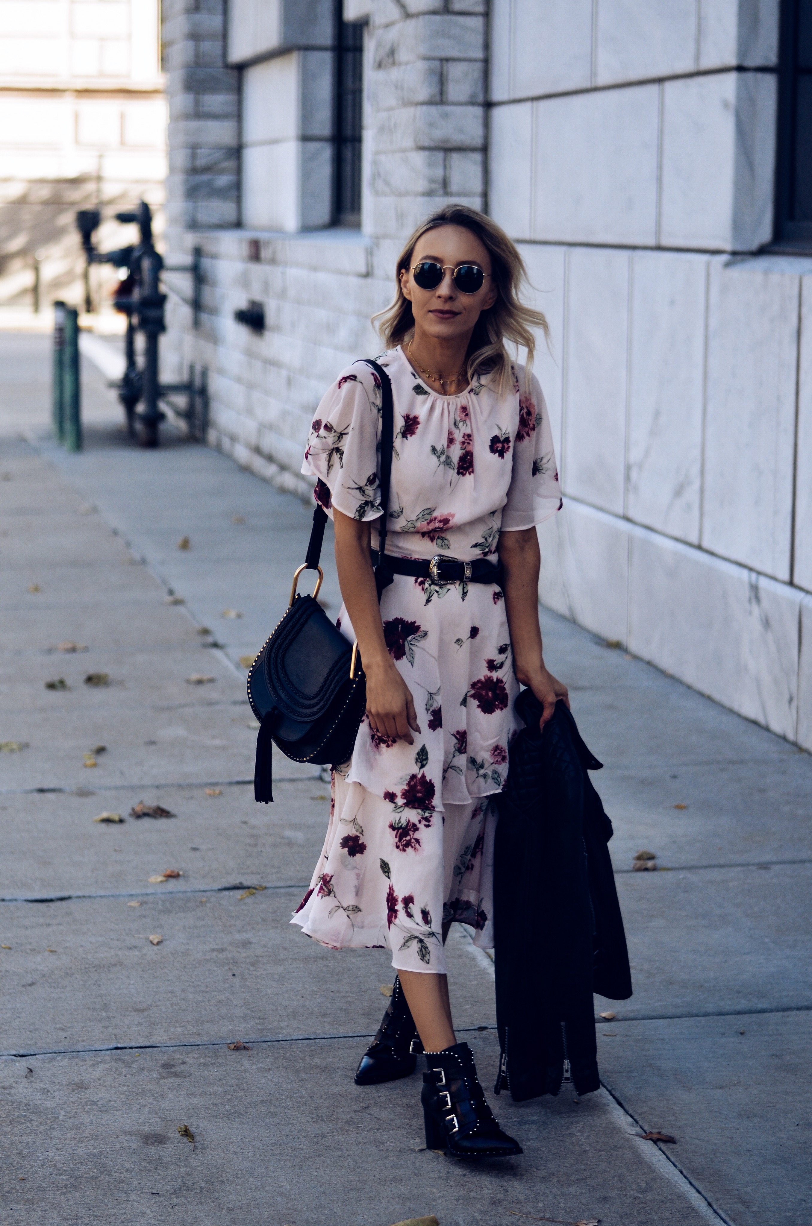 floral-dress-with-moto-jacket-and-studded-booties